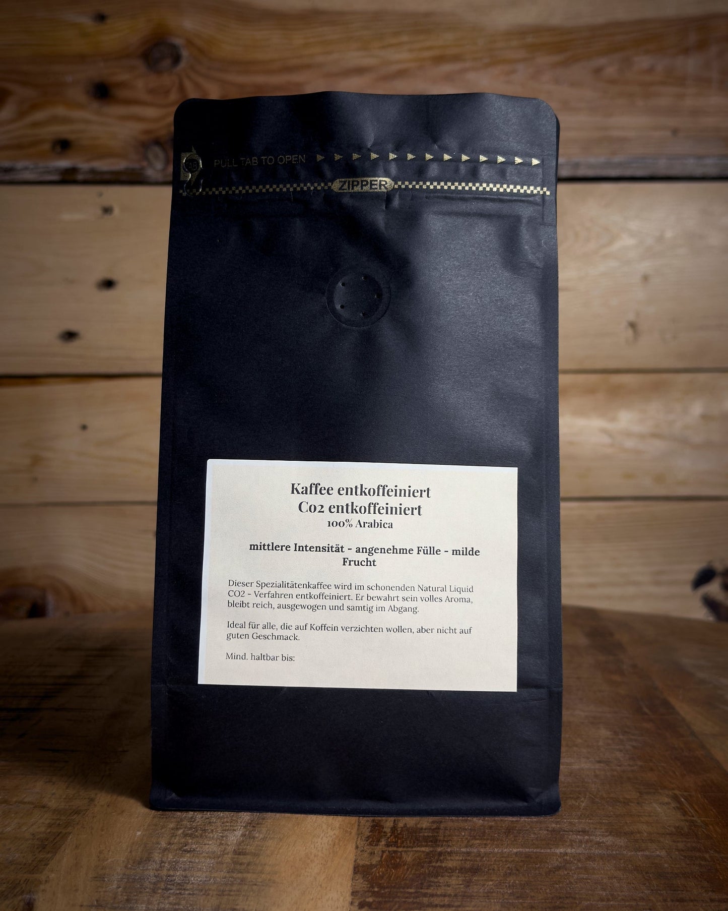 Rückansicht der 500g Kaffeetüte Kolumbien Huila Entkoffeiniert mit Details zu Röstung und Geschmack.