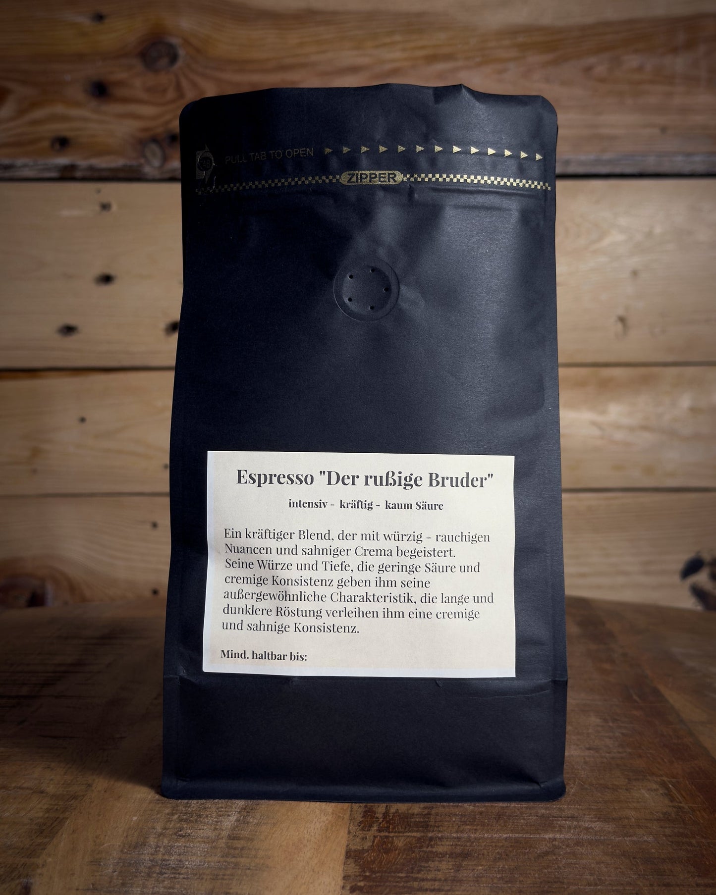 Rückansicht der 500g Kaffeetüte Espresso Der rußige Bruder mit Details zu Röstung und Geschmack.