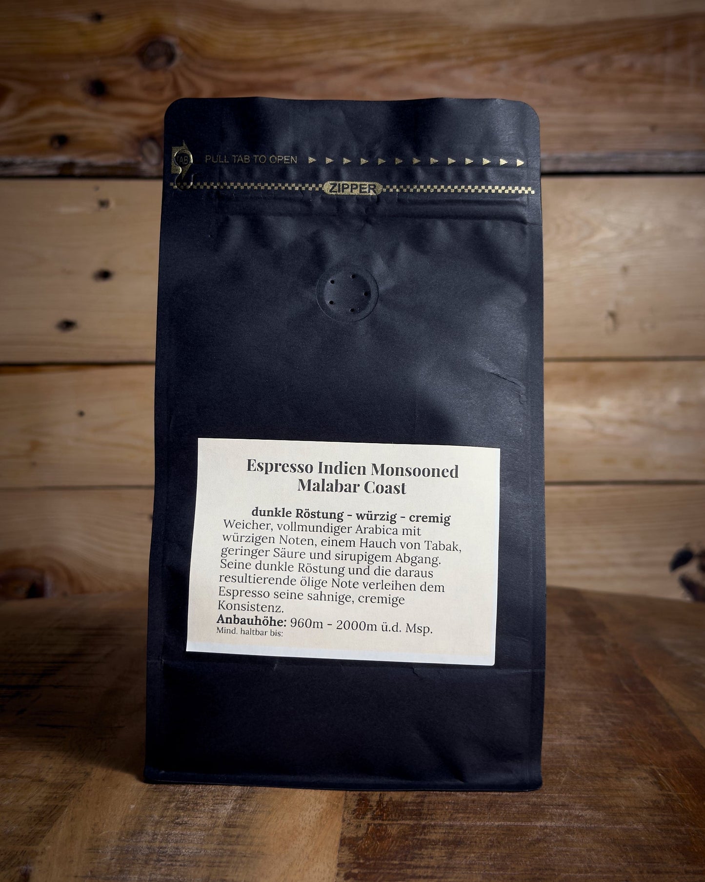 Rückansicht der 500g Kaffeetüte Espresso Indien Malabar mit Details zu Röstung und Geschmack.