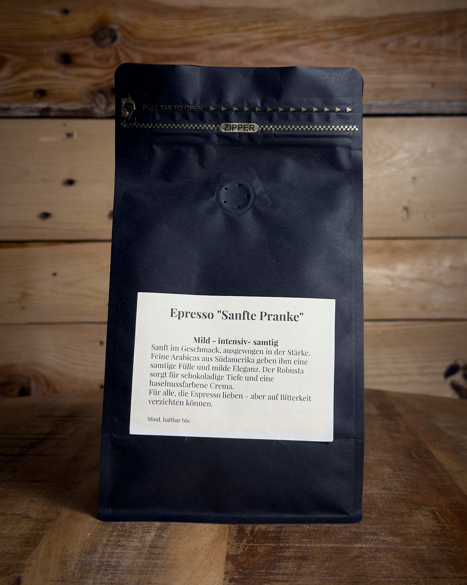 Rückansicht der 500g Kaffeetüte Espresso Sanfte Pranke mit Details zu Röstung und Geschmack.