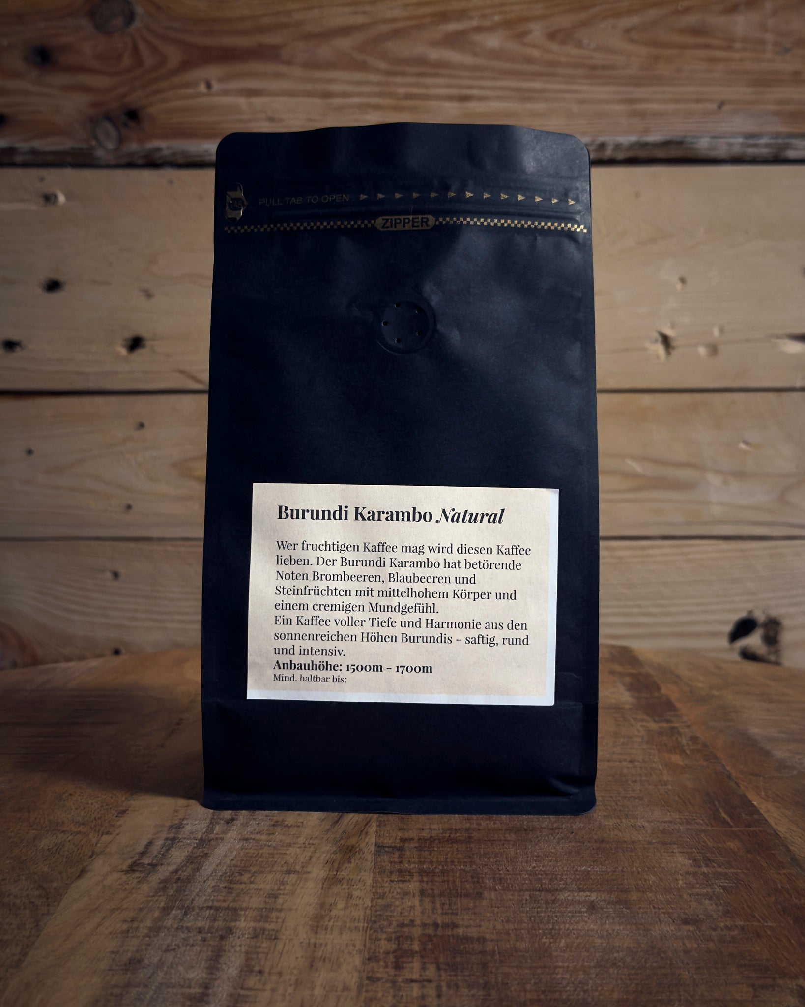 Rückansicht der 500g Kaffeetüte Burundi Muyinga mit Details zu Röstung und Geschmack.